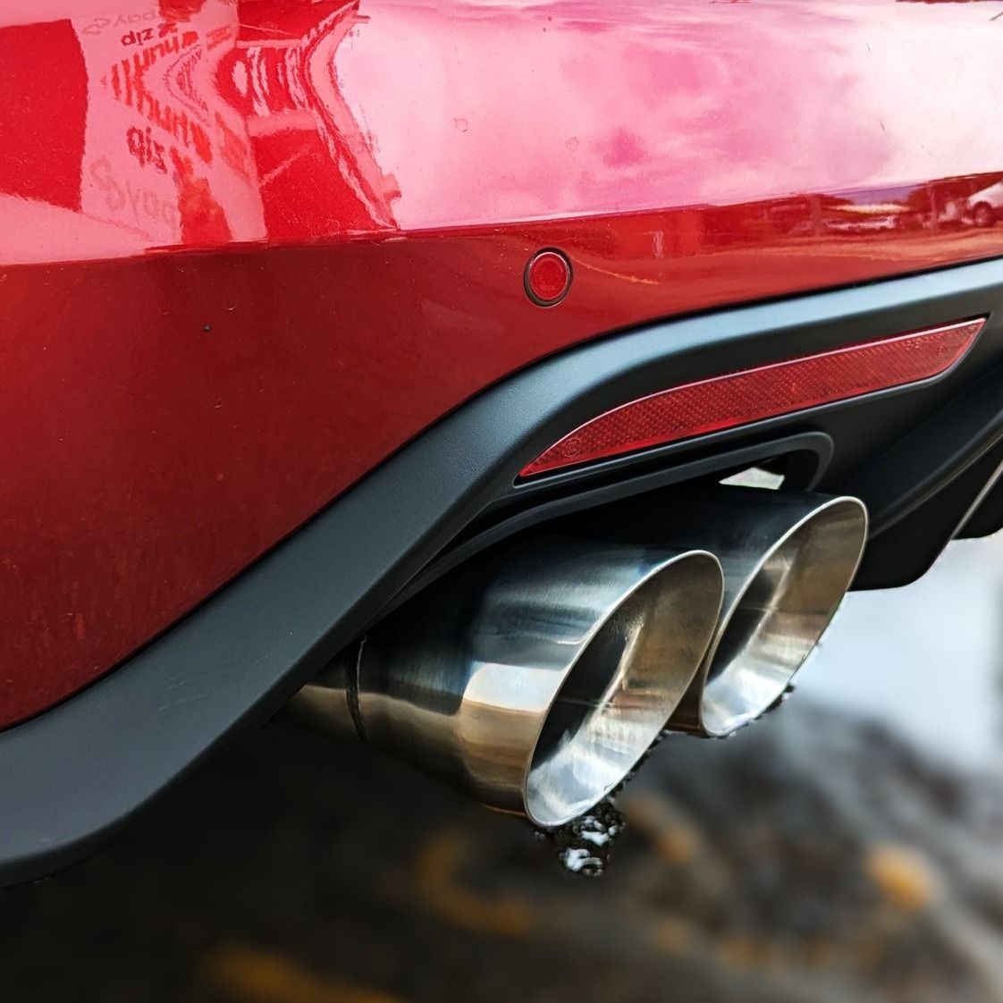 Red Car Exhaust Pipes — Aitkenvale Exhausts & Towbars Pty Ltd In Aitkenvale, QLD