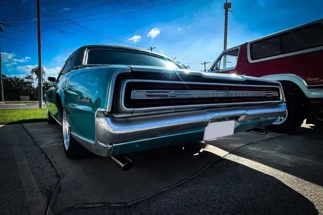 Teal Classic Car Parked — Aitkenvale Exhausts & Towbars Pty Ltd In Aitkenvale, QLD