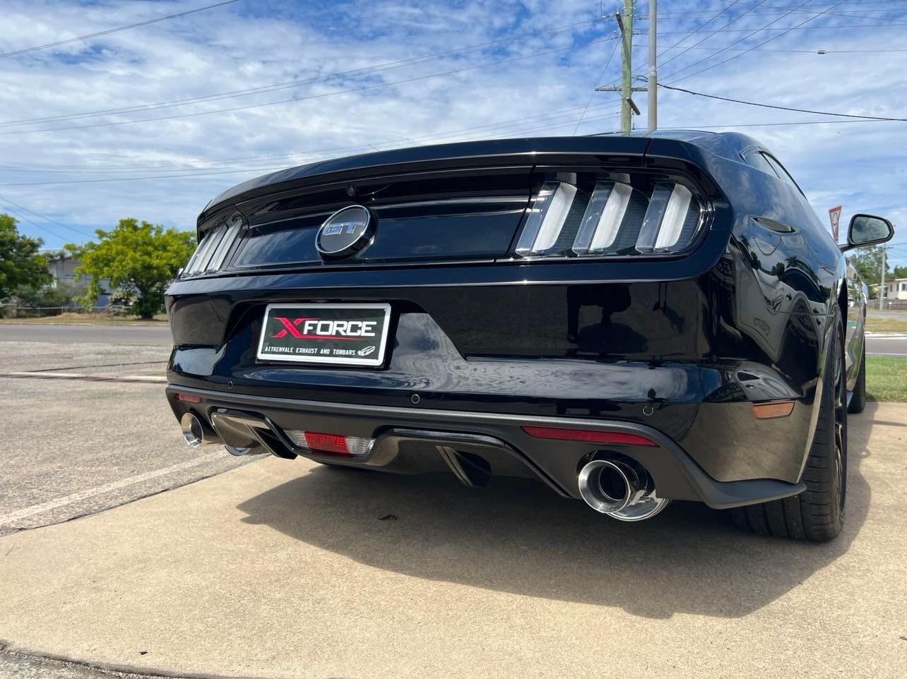 Black Ford Mustang with XForce Exhaust — Aitkenvale Exhausts & Towbars Pty Ltd In Aitkenvale, QLD
