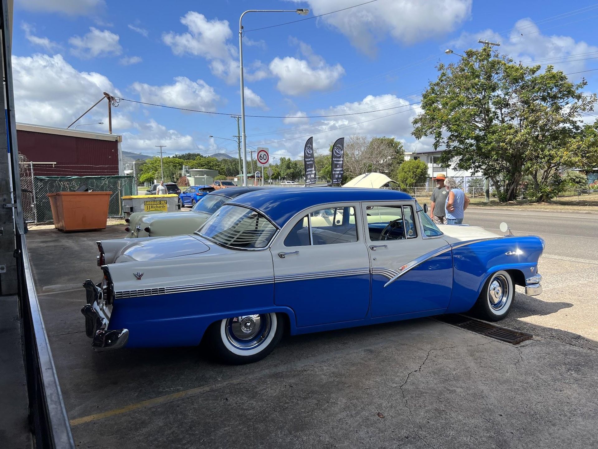 Blue and White Vintage Car Parked on a Street — Aitkenvale Exhausts & Towbars Pty Ltd In Aitkenvale, QLD