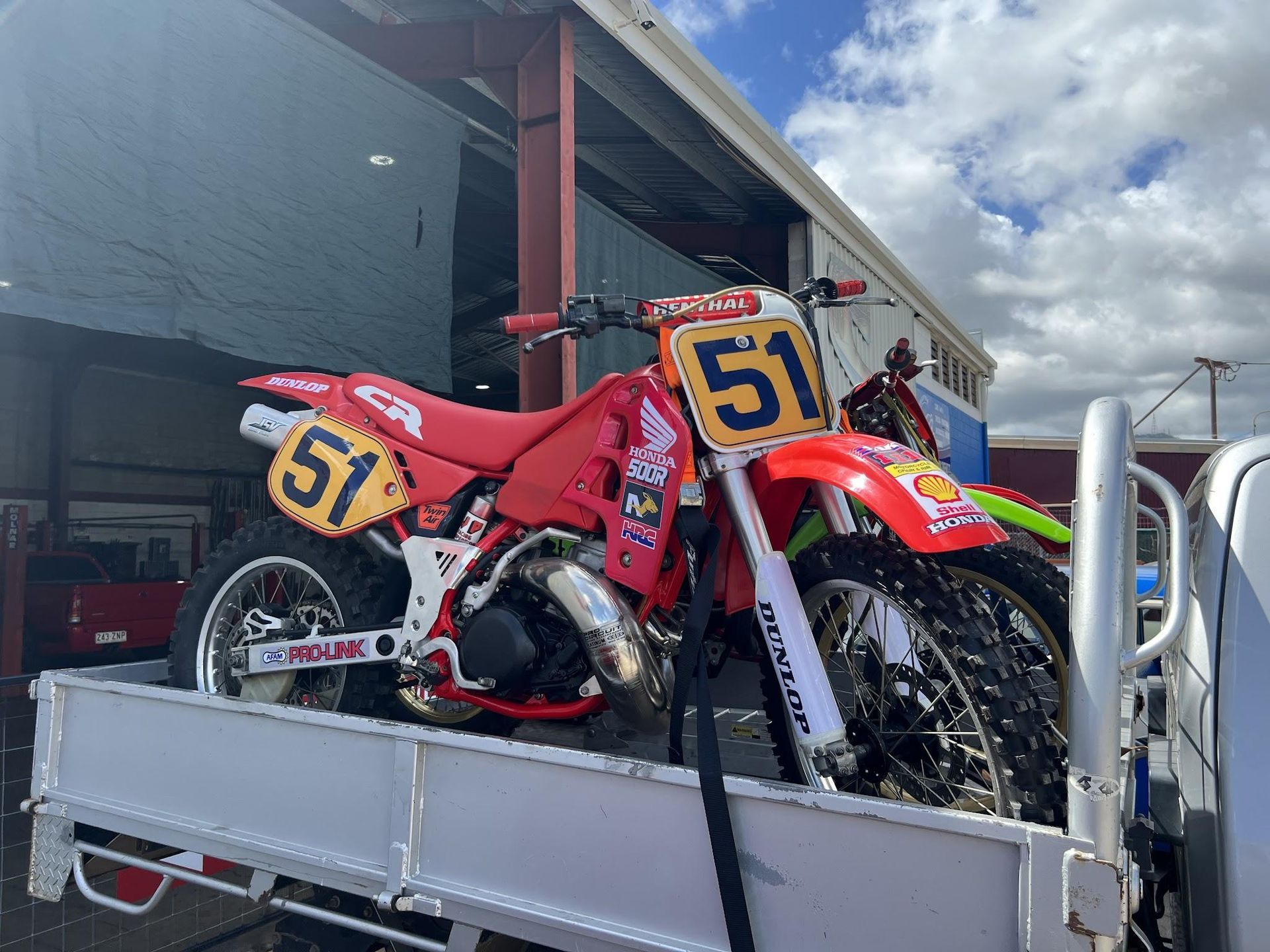 Red Honda Dirt Bike — Aitkenvale Exhausts & Towbars Pty Ltd In Aitkenvale, QLD