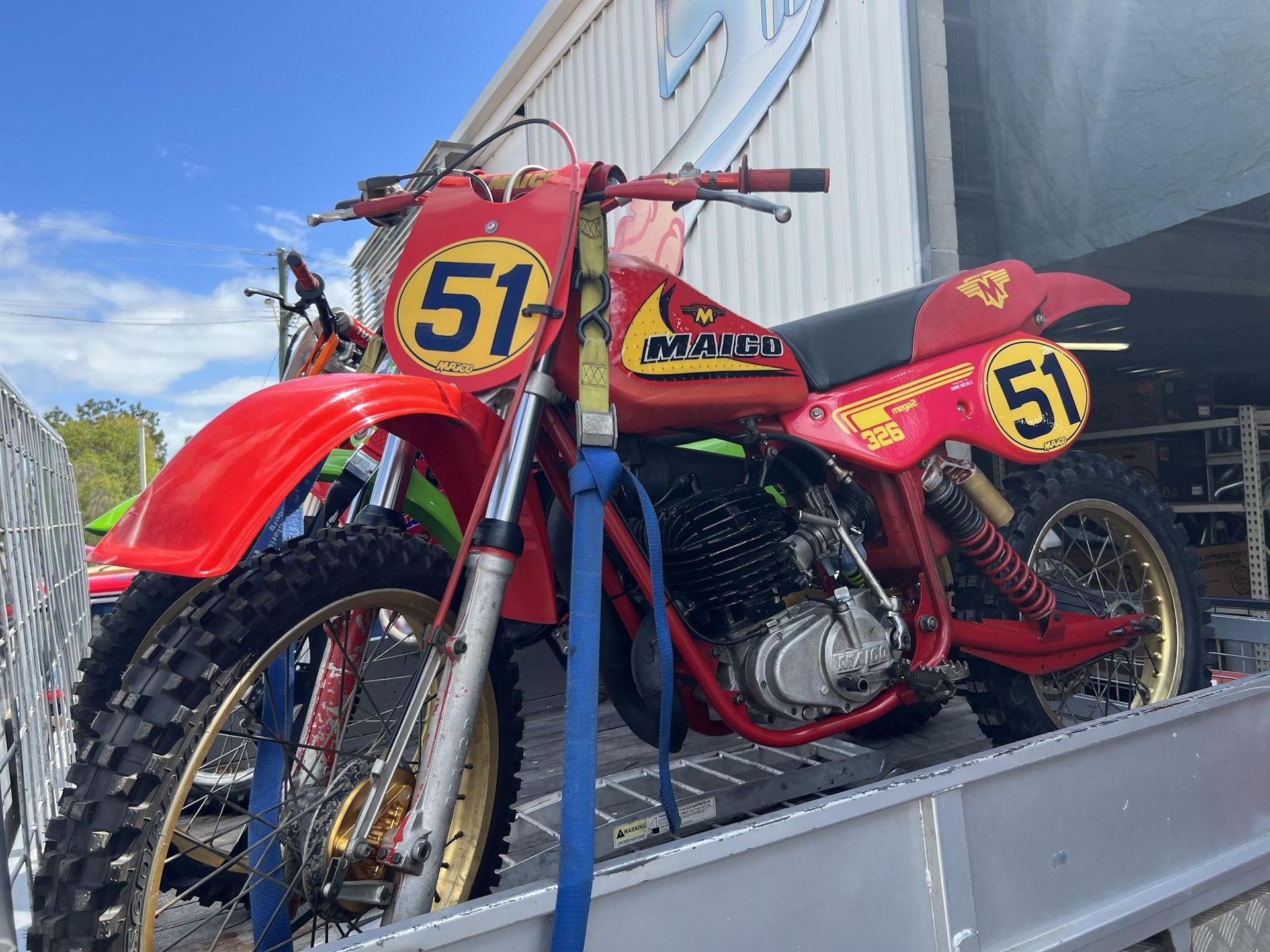 Red Vintage Motocross Bike — Aitkenvale Exhausts & Towbars Pty Ltd In Aitkenvale, QLD