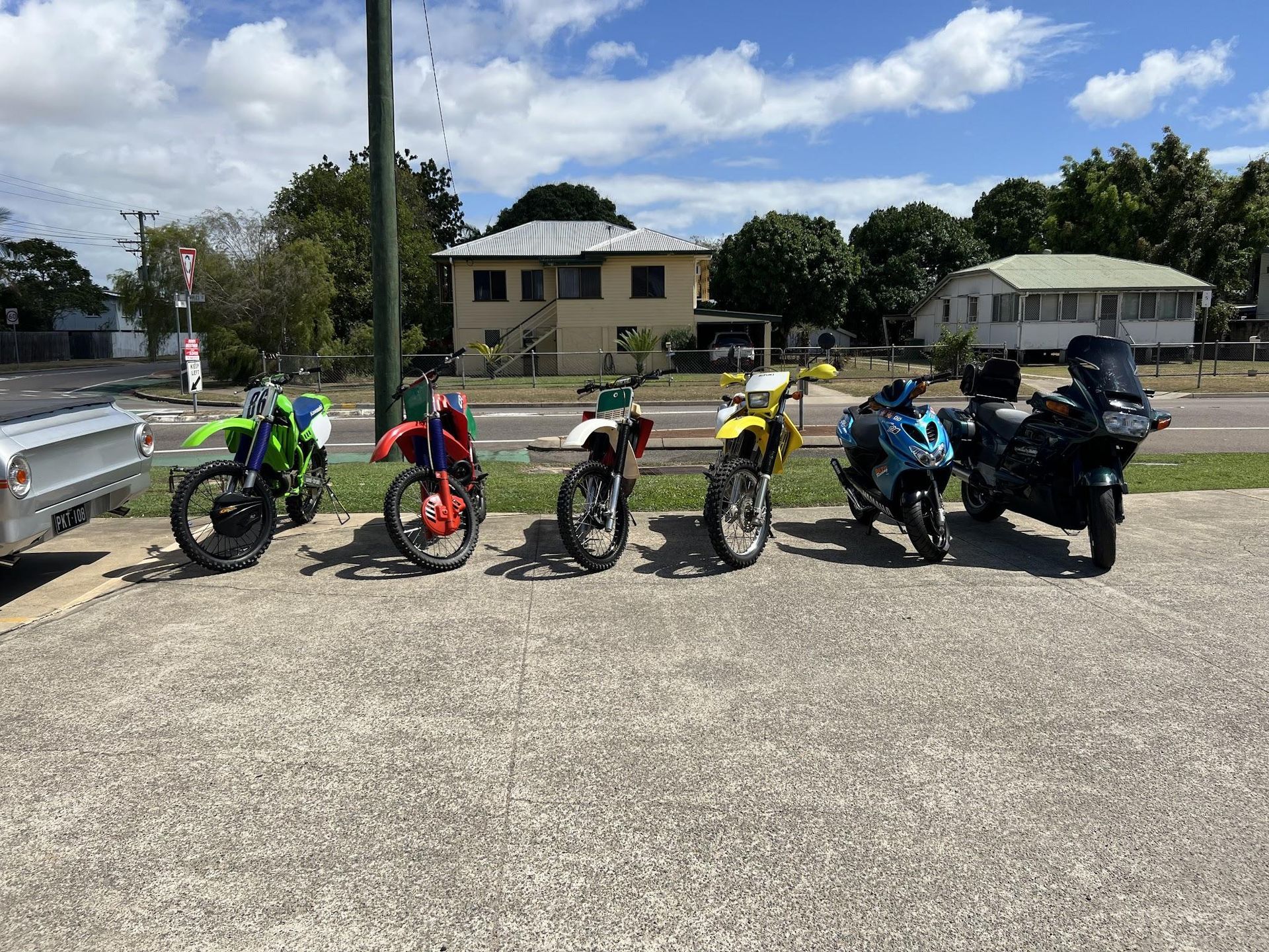 Five Motorcycles Parked on a Concrete Surface — Aitkenvale Exhausts & Towbars Pty Ltd In Aitkenvale, QLD