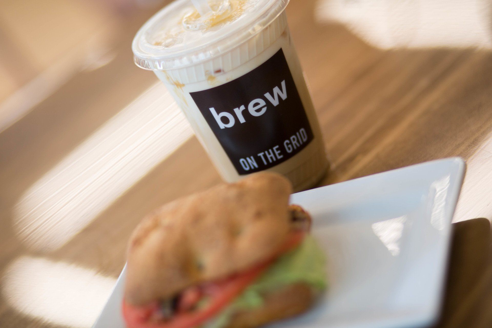 brew on the grid - image of coffee and sandwich