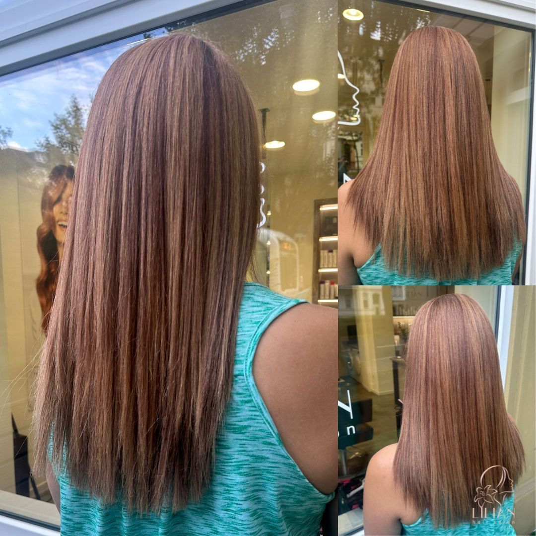 Eine Frau mit langen braunen Haaren steht vor einem Fenster.