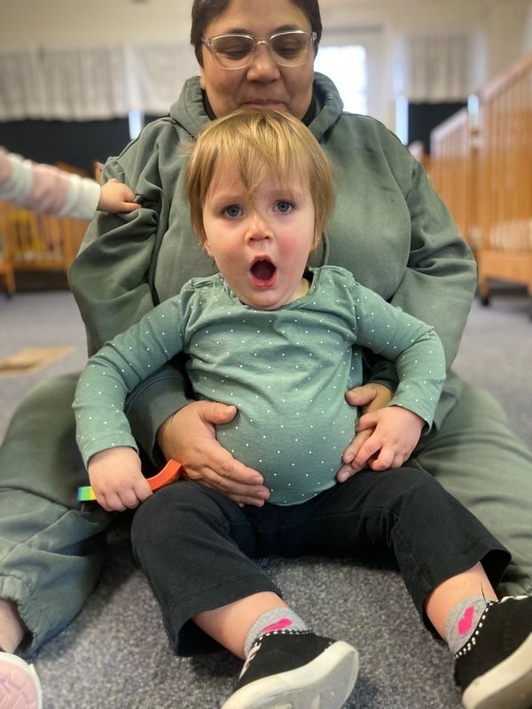 Infant with wooden cube