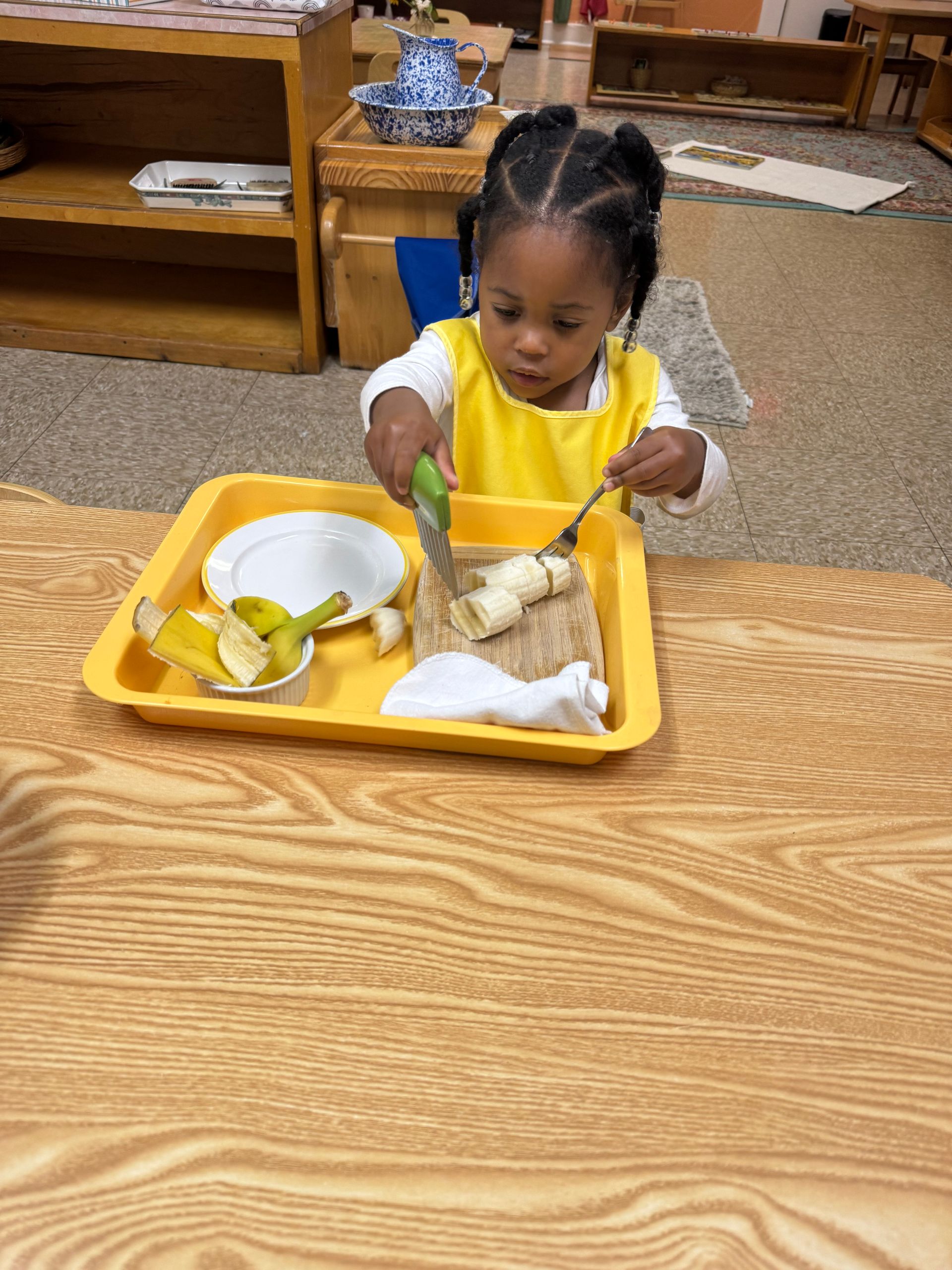 Child and guide in the classroom