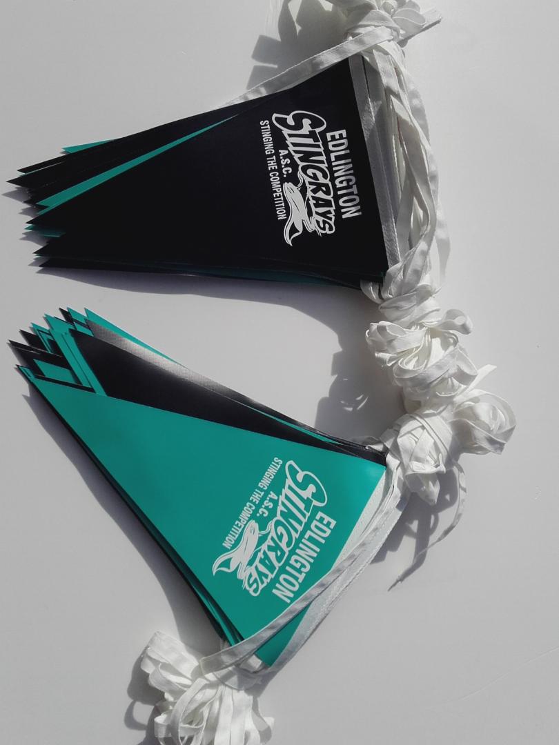 A bunch of flags with the word sharks on them