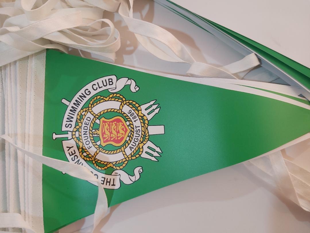 A green flag with the words swimming club on it