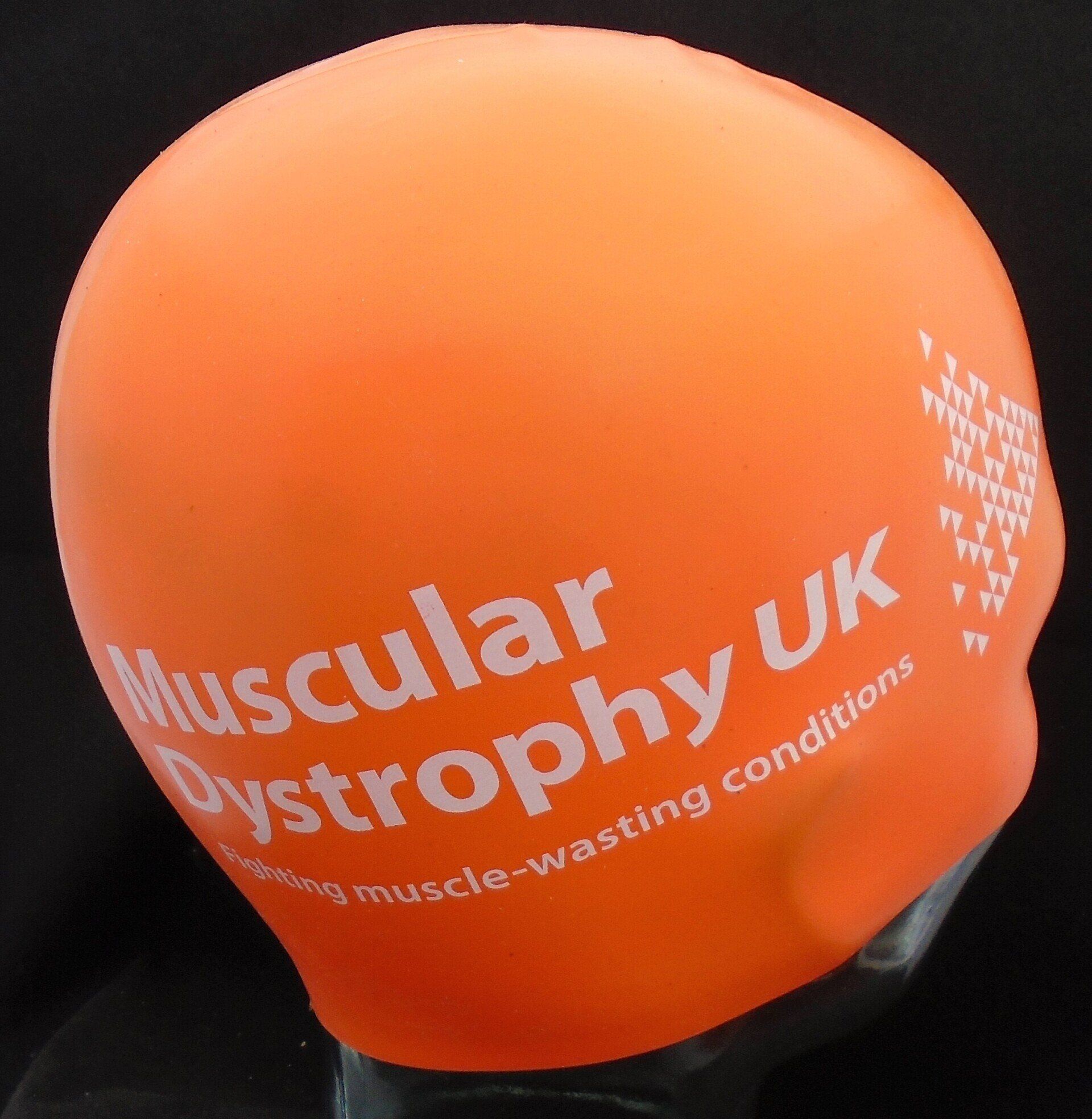 En orange badehætte med teksten 