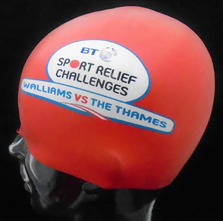 A red swim cap that says bt sport relief challenges