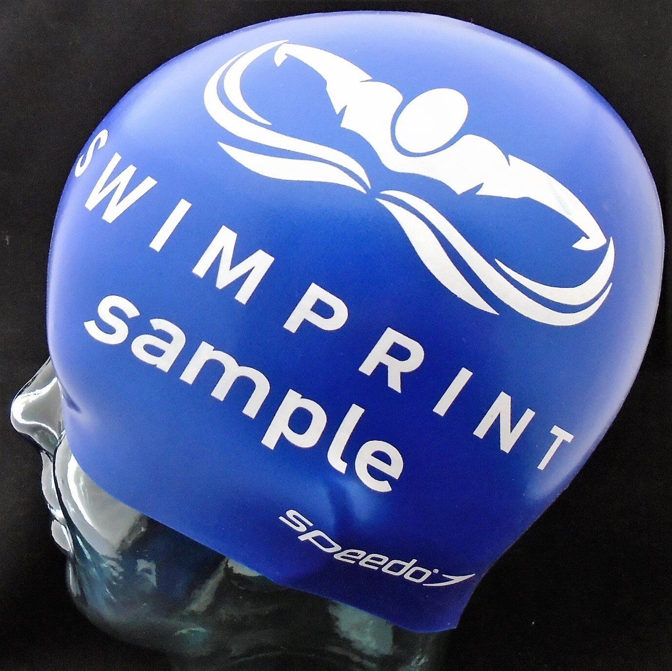A blue swim cap that says swimprint sample on it