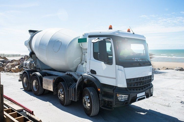 A concrete truck ready to pour concrete for a residential project in Launceston TAS.