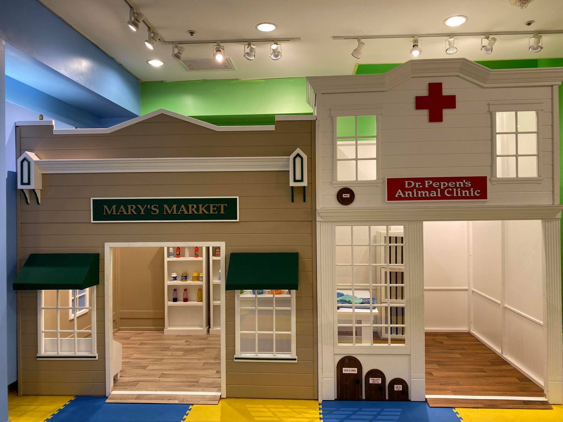 A playhouse with a market and a doctor 's office