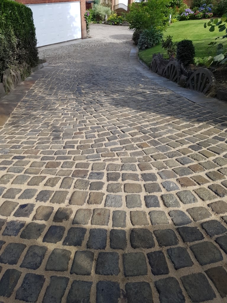 sloped brick driveway