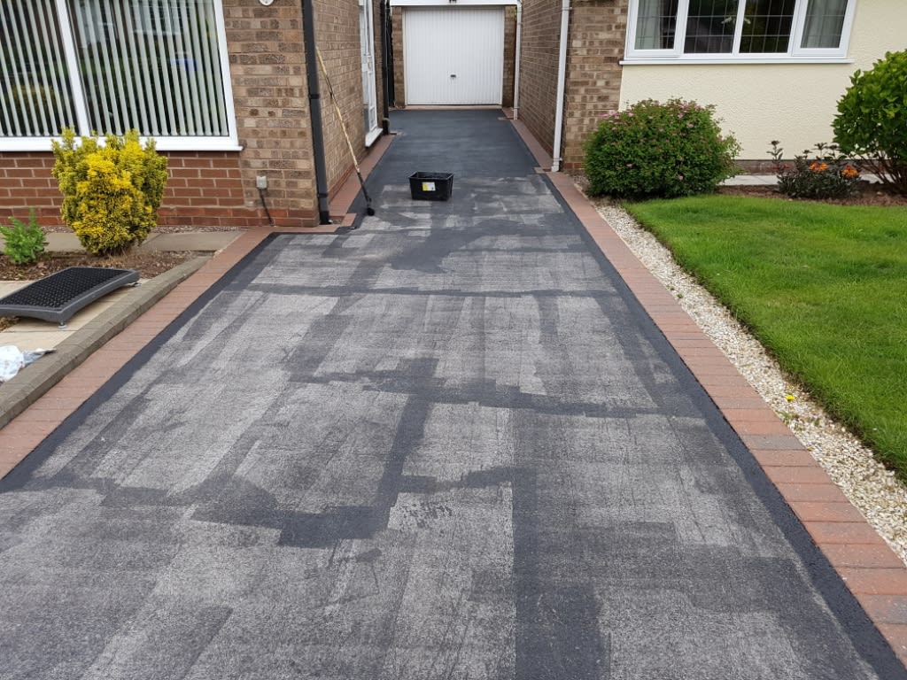 dirty tarmac driveway