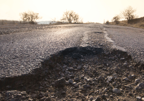 How Potholes Can Damage Your Vehicle