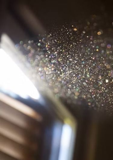 A close up of a ceiling with a lot of glitter on it.