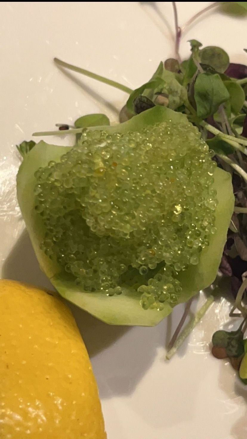 A white plate topped with green vegetables and a lemon | Cherry Hill, NJ | Mikado