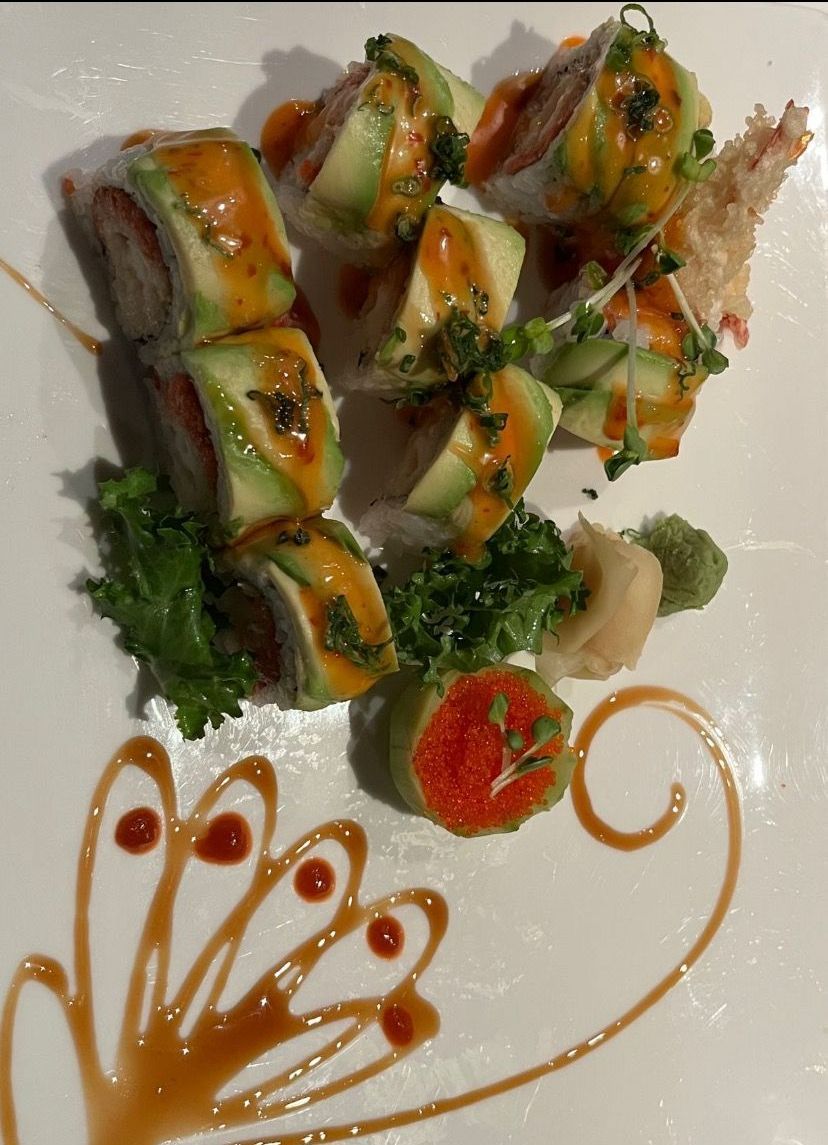 A white plate topped with a variety of sushi and sauces | Cherry Hill, NJ | Mikado
