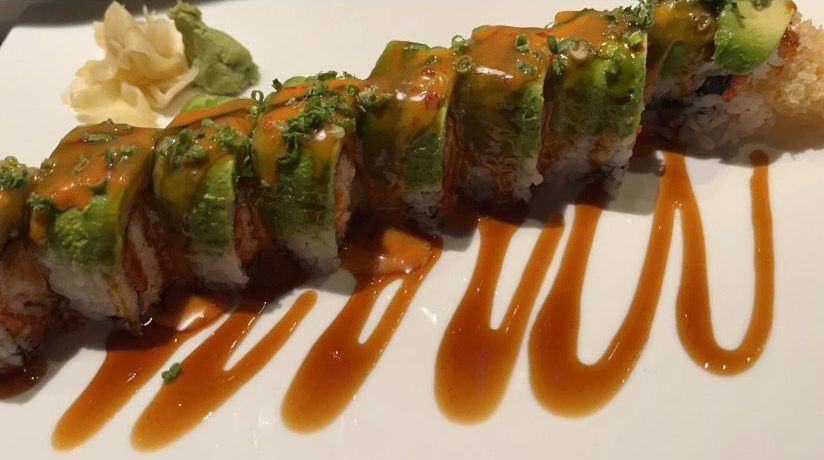A sushi roll with sauce on a white plate | Cherry Hill, NJ | Mikado