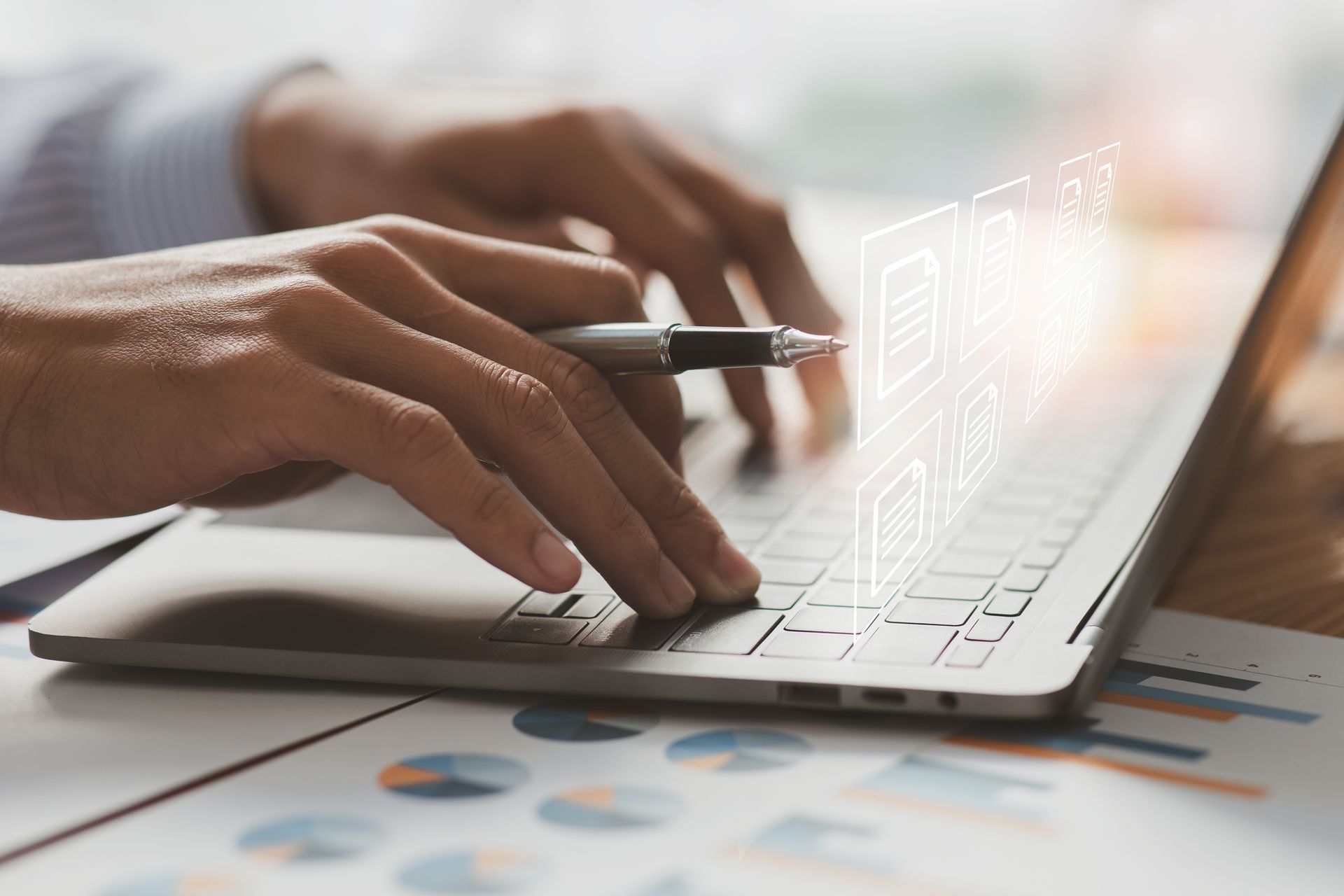 Close-up of a person typing on a laptop during a property title search
