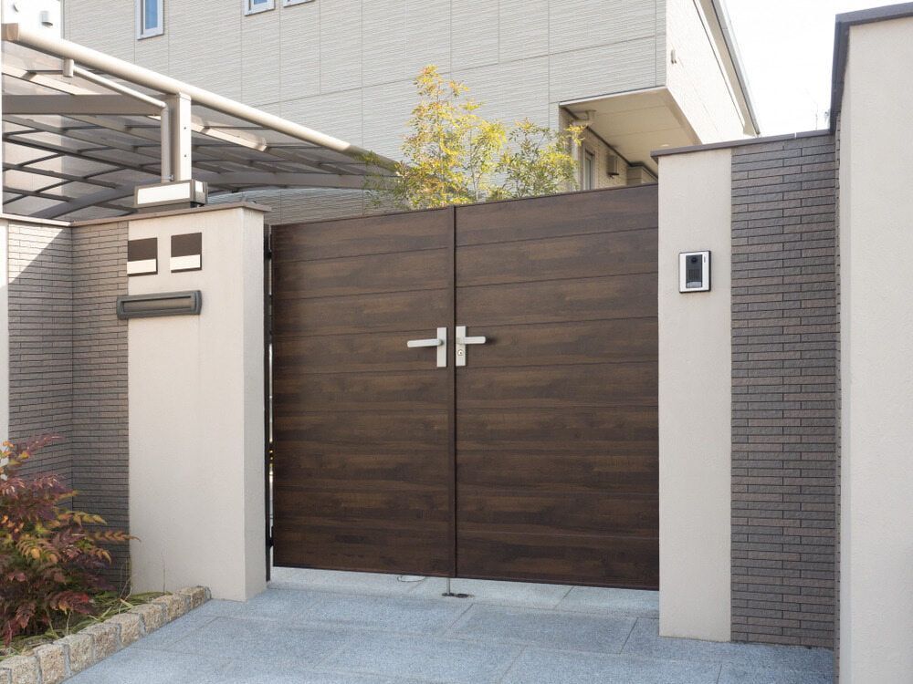 Dark Brown Double Gate With Silver Handles — Trade Fencing Supplies in Moolap, VIC