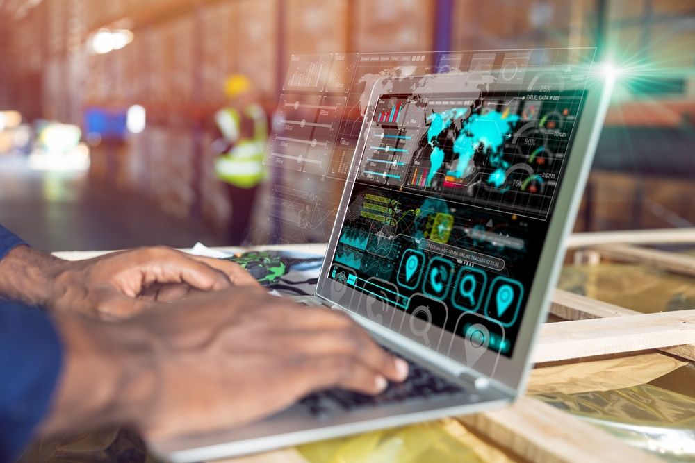 Warehouse staff using  technology inventory supply shipping tracking and storage management.