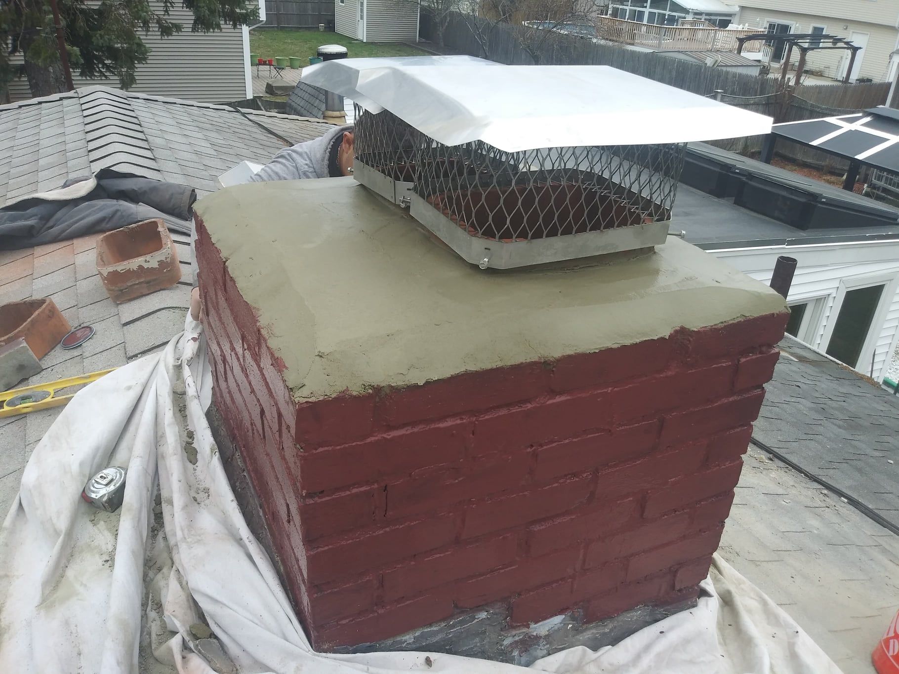rebuilt chimney with chimney cap in Winchester, MA