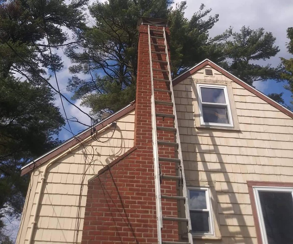 chimney cleaning ladder setup in wayland ma