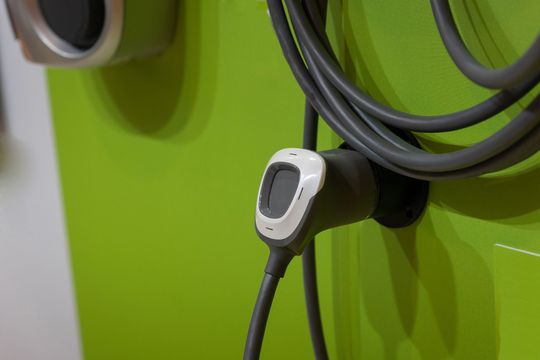 a close up of a charger attached to a wall