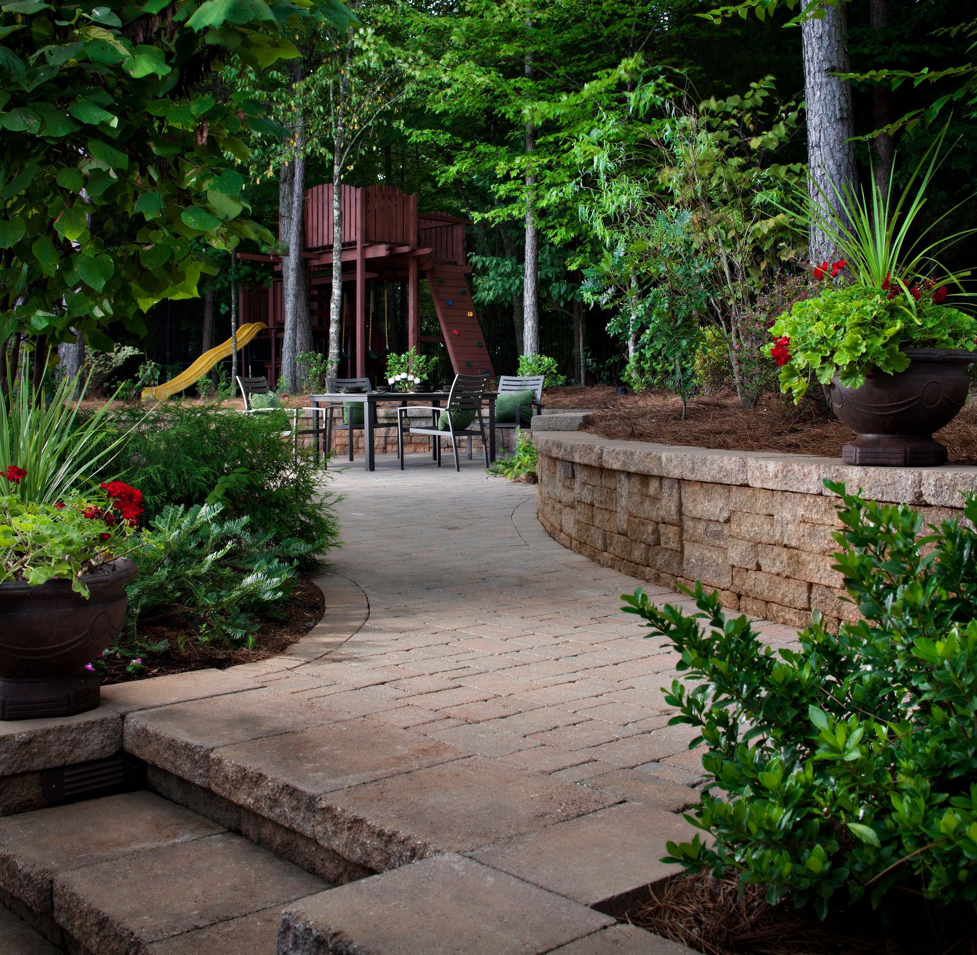 Paver Sidewalk and Retaining Wall Installation Cover Image - Thompson Brothers - Ooltewah