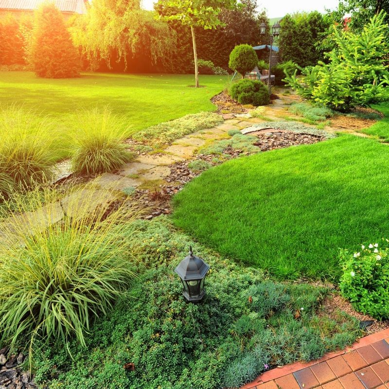 There is a lantern in the middle of the garden.