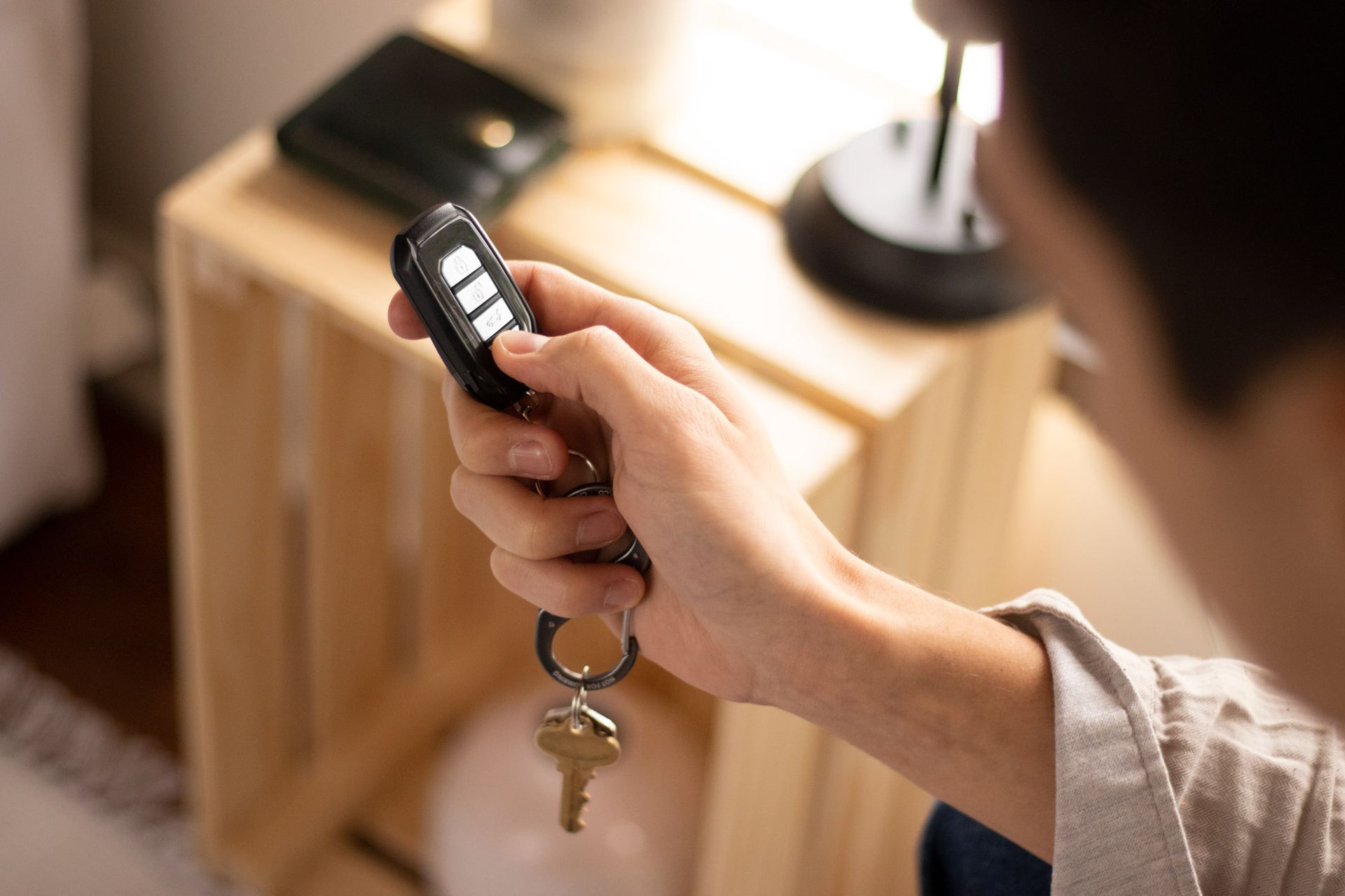 a person remote starting their vehicle from inside their home