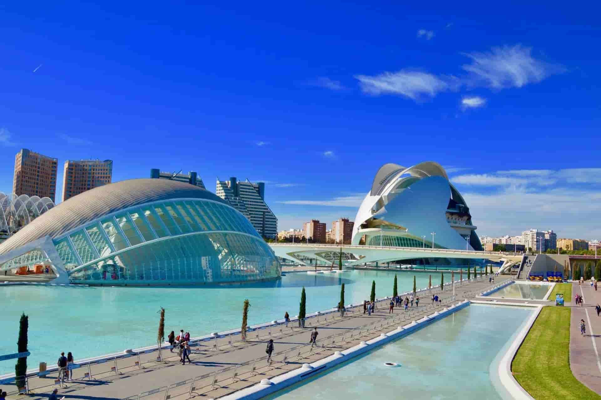 A large body of water in Valencia surrounded by buildings in a city.