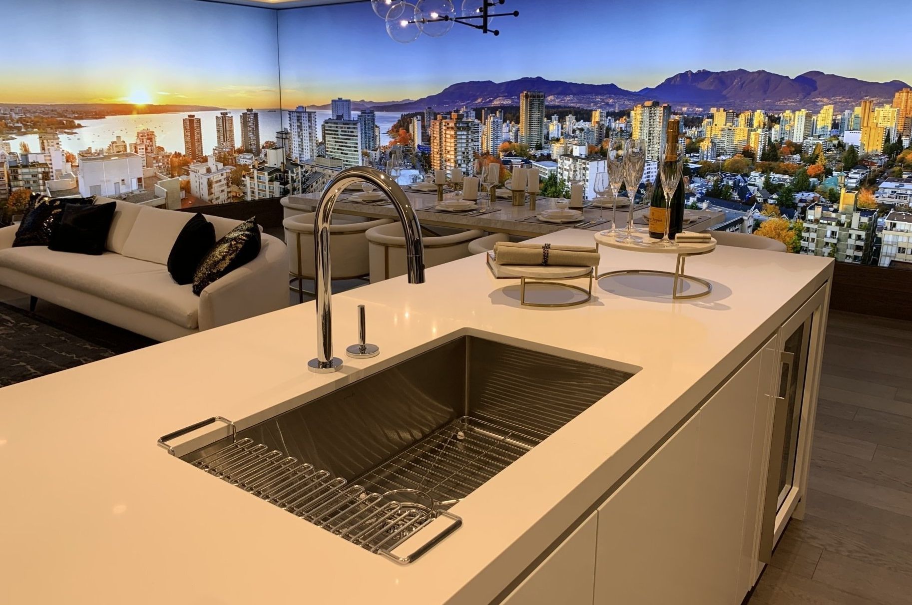 picture of a kitchen island in a home with a panoramic view of the city