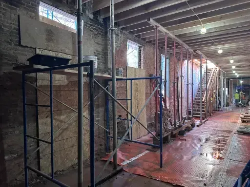 An old structure repair with extensive interior shoring.