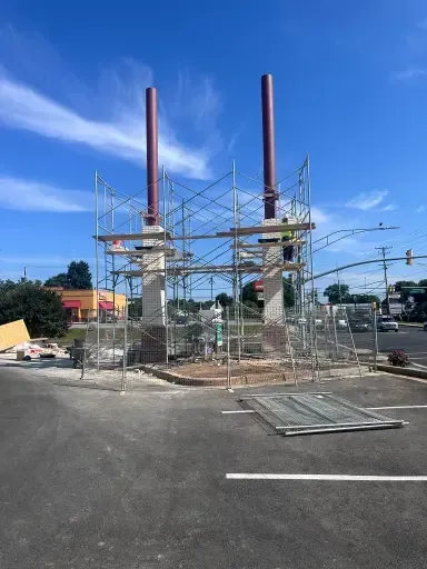Premier masonry and concrete contractors building sign pillars.
