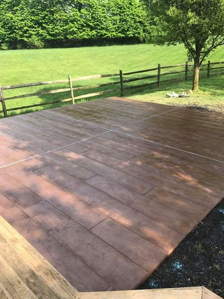 stamped concrete resembling wooden porch