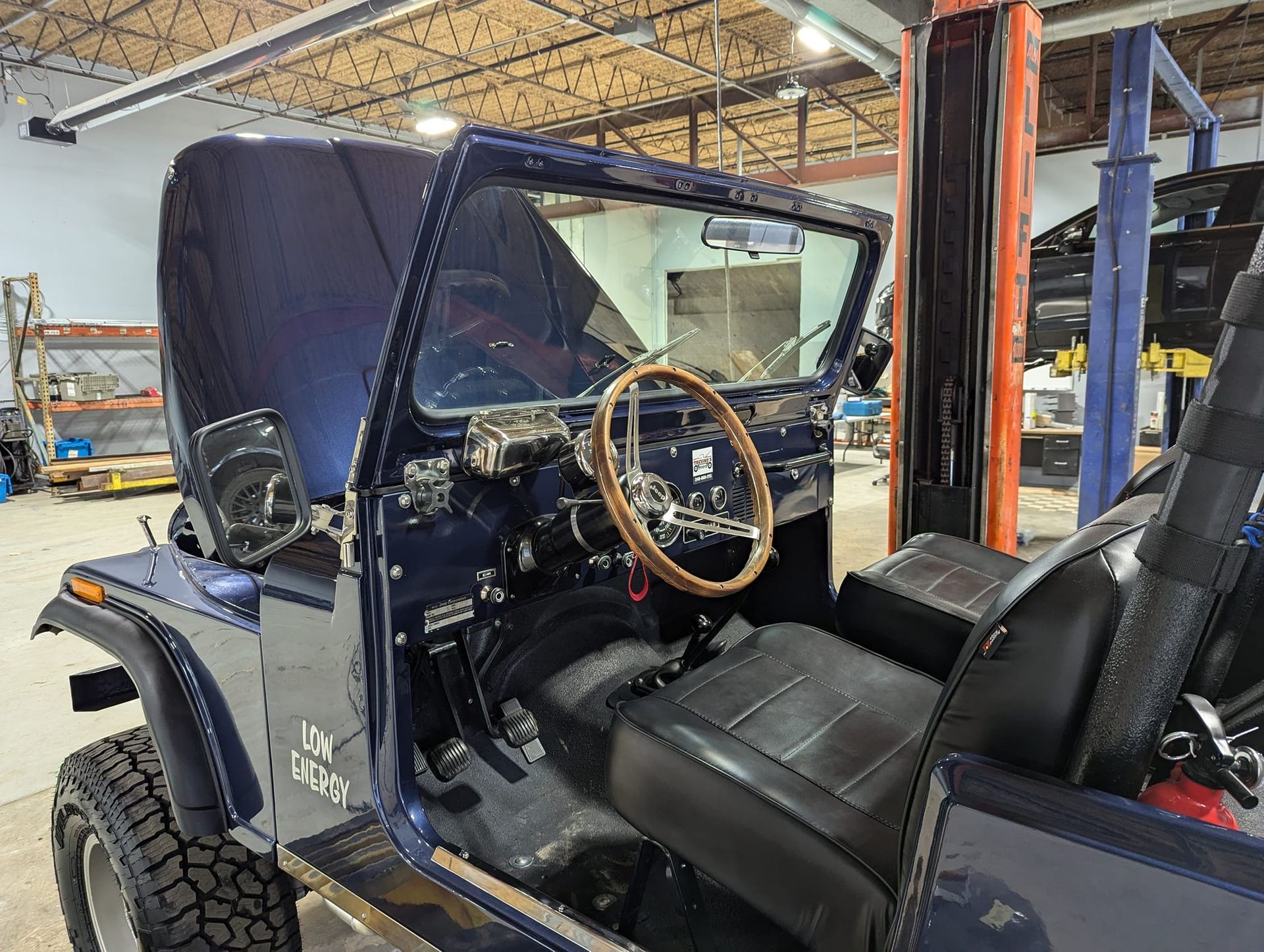 An aerial view of a large wave in the ocean.