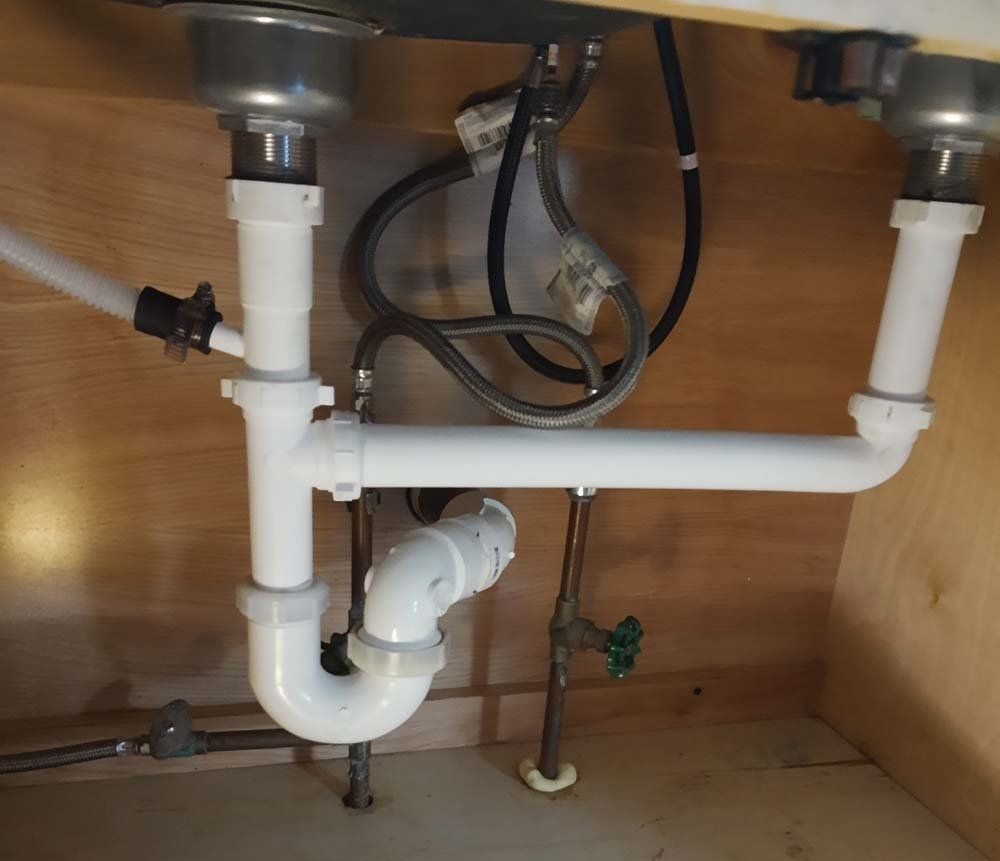 New sink drain for double kitchen sink