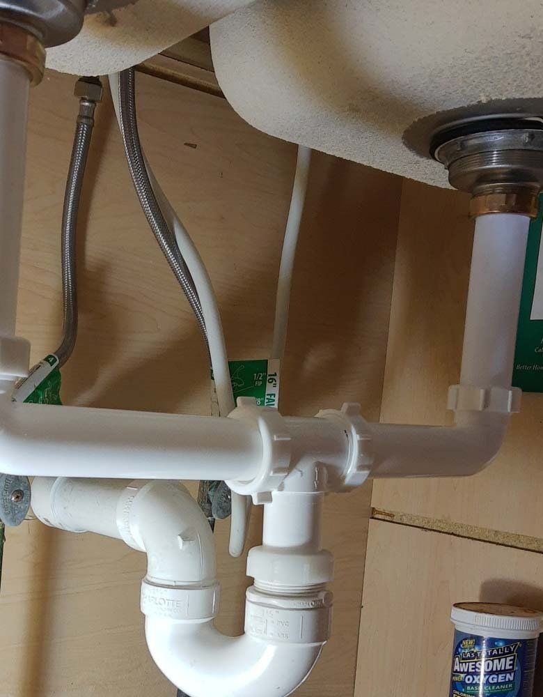 New drain set up for double kitchen sink