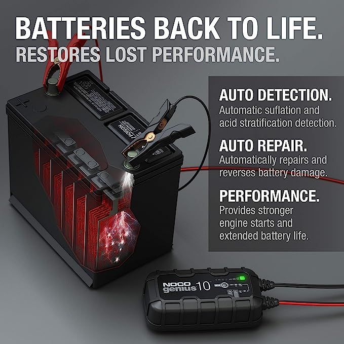 A picture of a battery being charged by a battery charger.