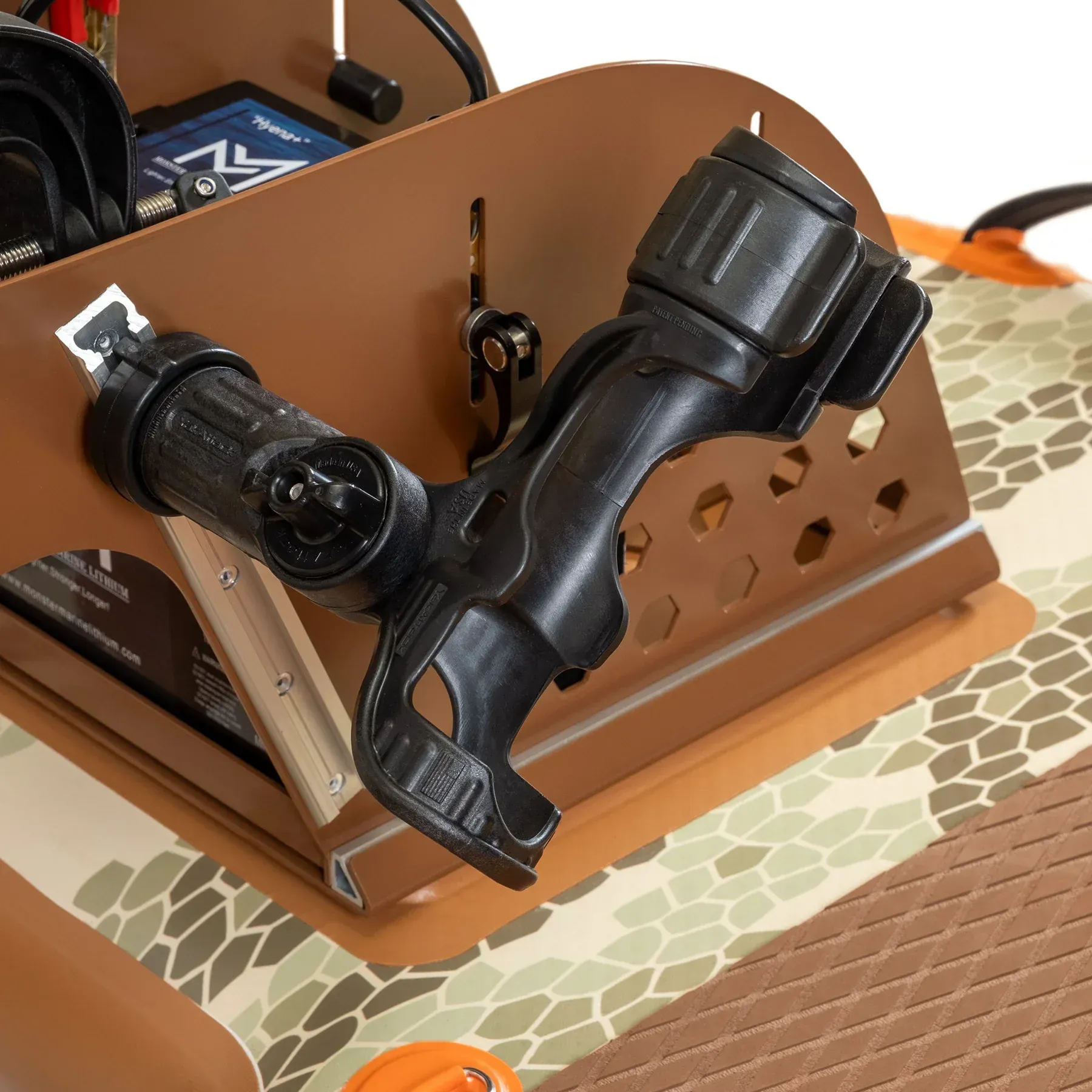 A close up of a fishing rod holder on a boat