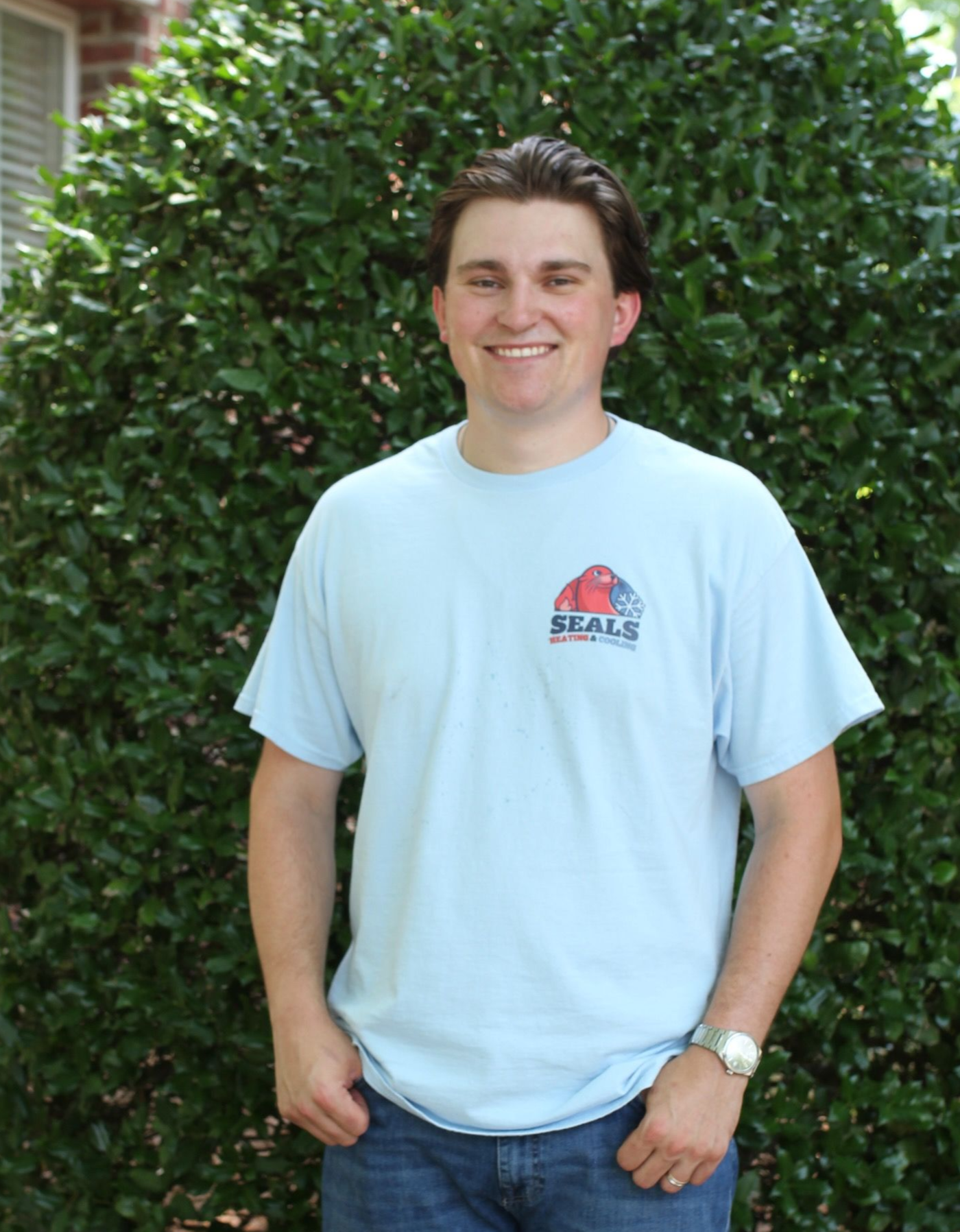 Man in blue shirt with 