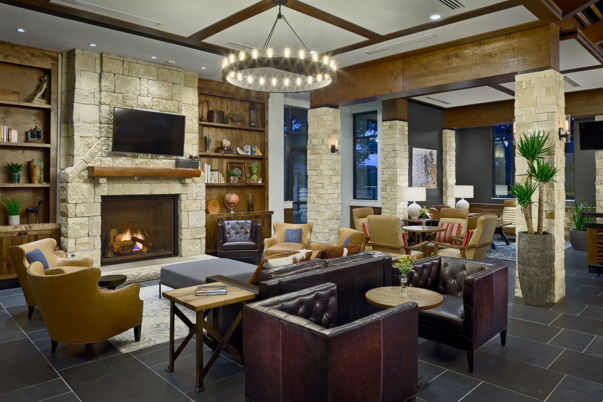 A living room filled with furniture and a fireplace.