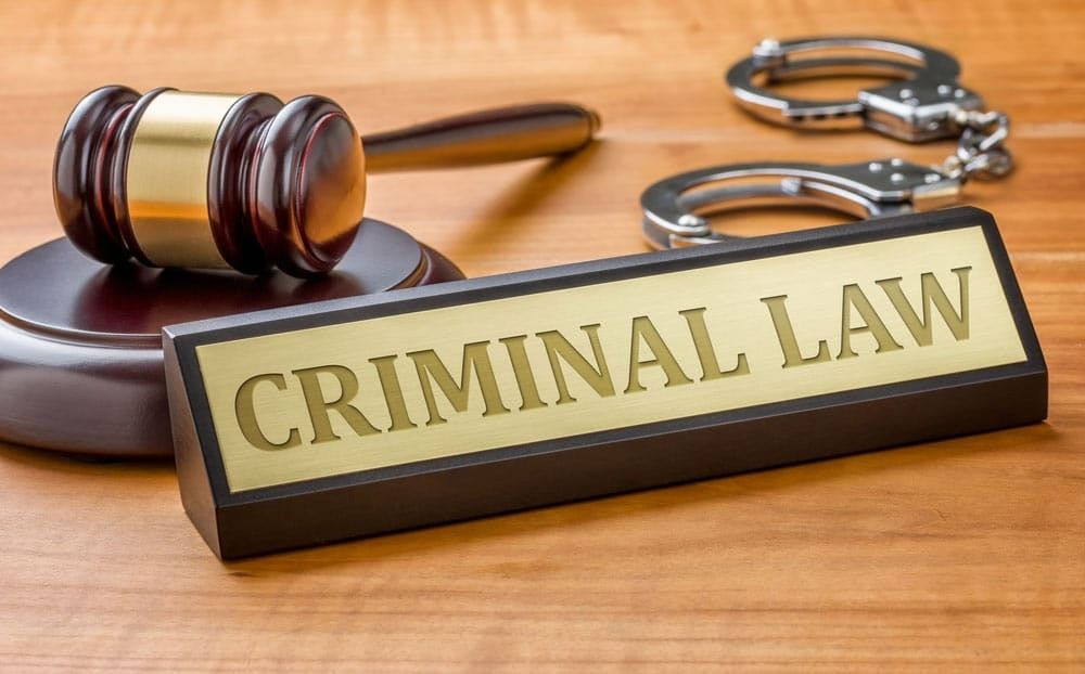 Criminal Law Sign with Gavel and Handcuffs