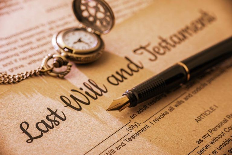 A Pen Is Sitting On Top Of A Last Will And Testament — Spencer Lawyers In Gosford, NSW