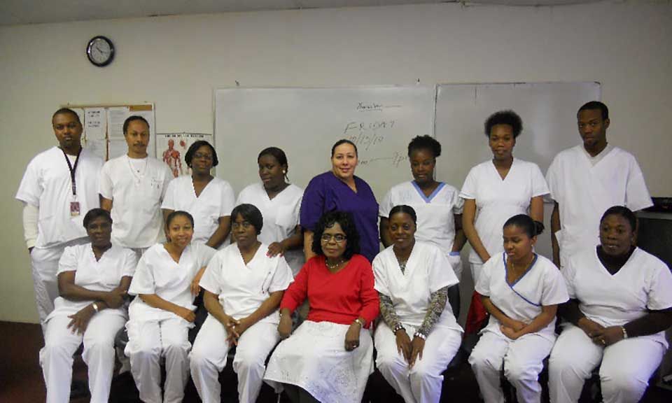 A group of nurses are posing for a picture together