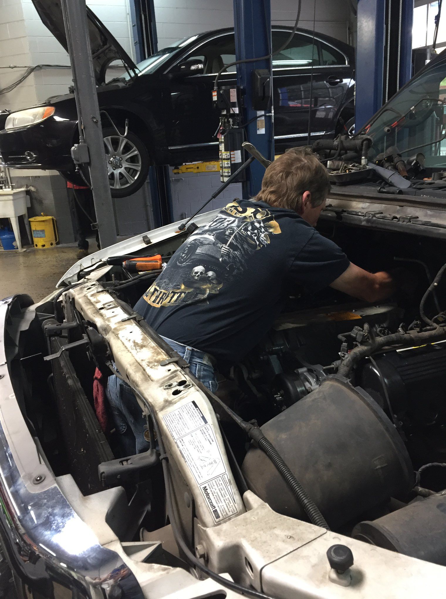 Man Repairing the Car — Dalton, GA — Tate Automotive